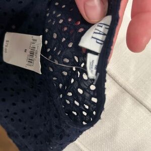 Dress eyelet with wrap around sash. Gap